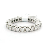 Luxurious anniversary style wedding band round-cut gemstones along with round-cut sparkling diamonds